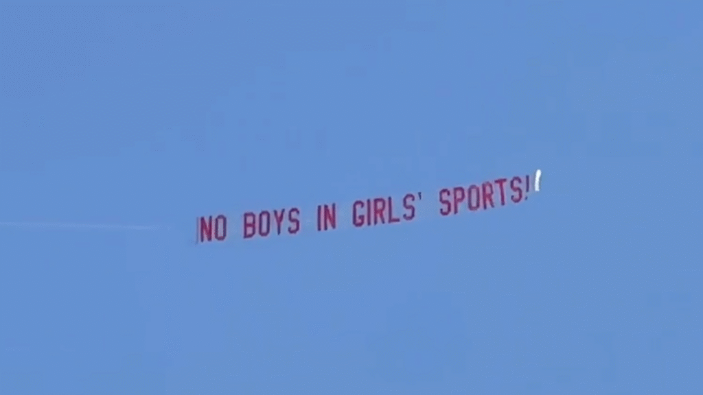 Plane flying ‘No Boys in Girls’ Sports’ banner over track meet goes viral as trans athlete dominates